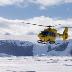 Helicopter_Flying_Antarctica_©_Michelle_Sole_Quark_Expeditions