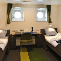 MV_Ortelius_twin_porthole_cabin_deck_4_©_Monica_Salmang_Oceanwide_Expeditions