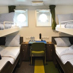 MV_Ortelius_Quadruple_cabin_deck_4_©_Monica_Salmang_Oceanwide_Expeditions